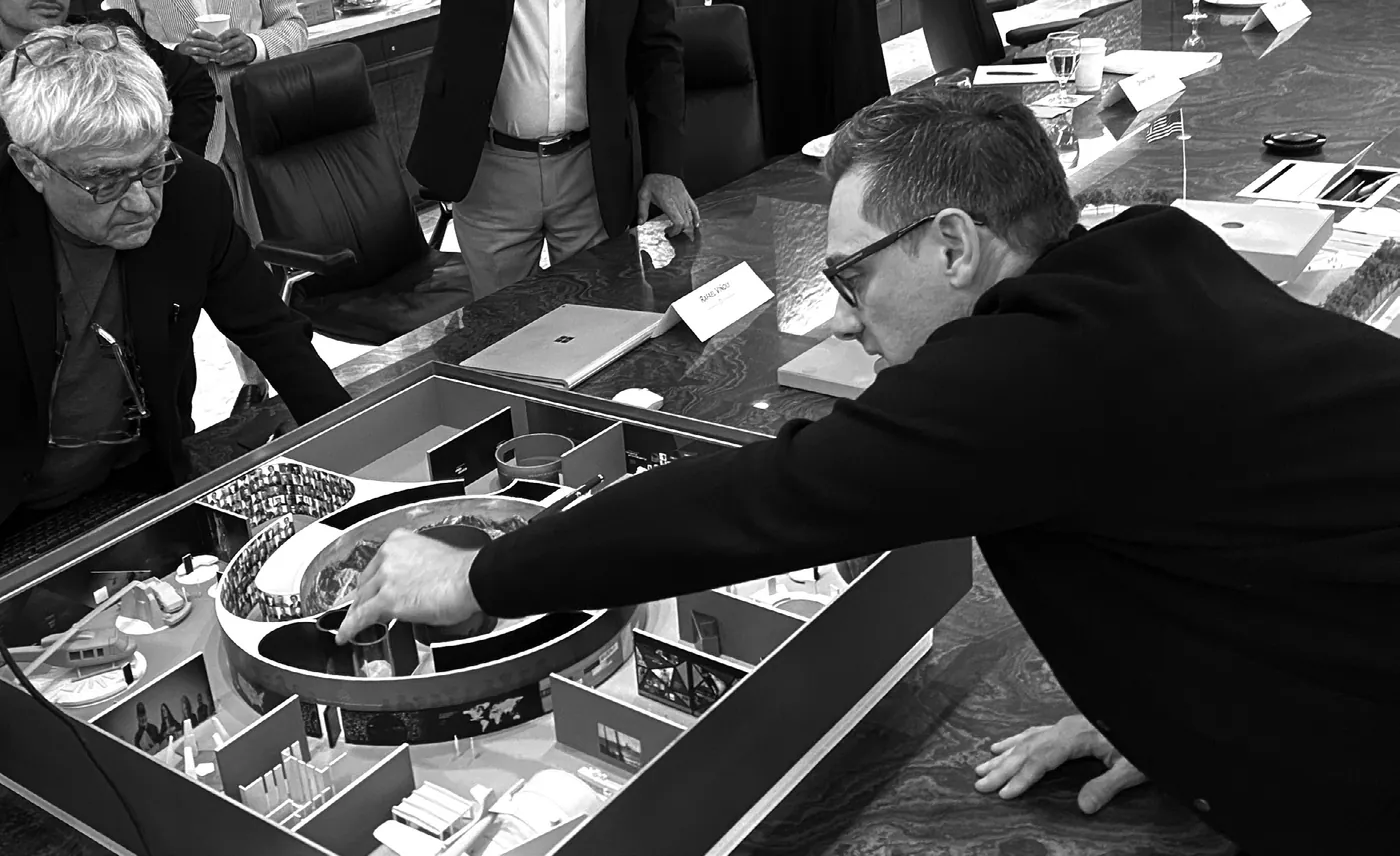 Design team reviewing a physical exhibition model