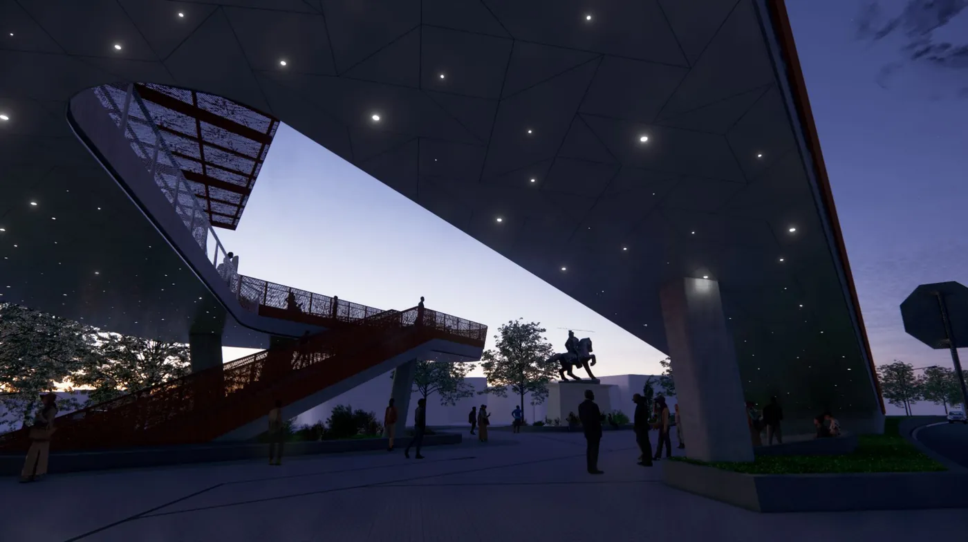 The same view at dusk: points of light glow across the ramp’s underside like stars
