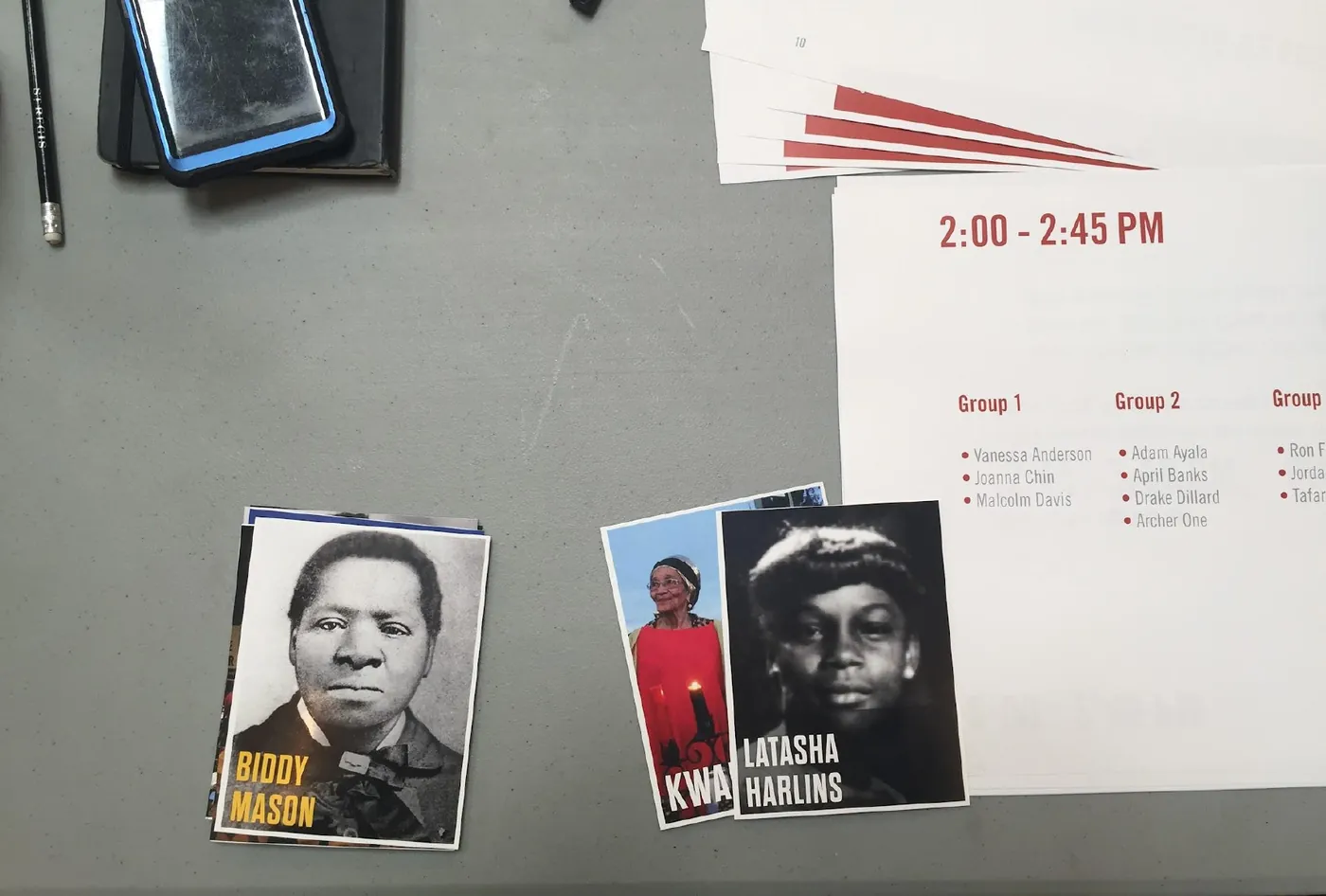 Story cards pinned to a wall, including portraits of Biddy Mason and Latasha Harlins